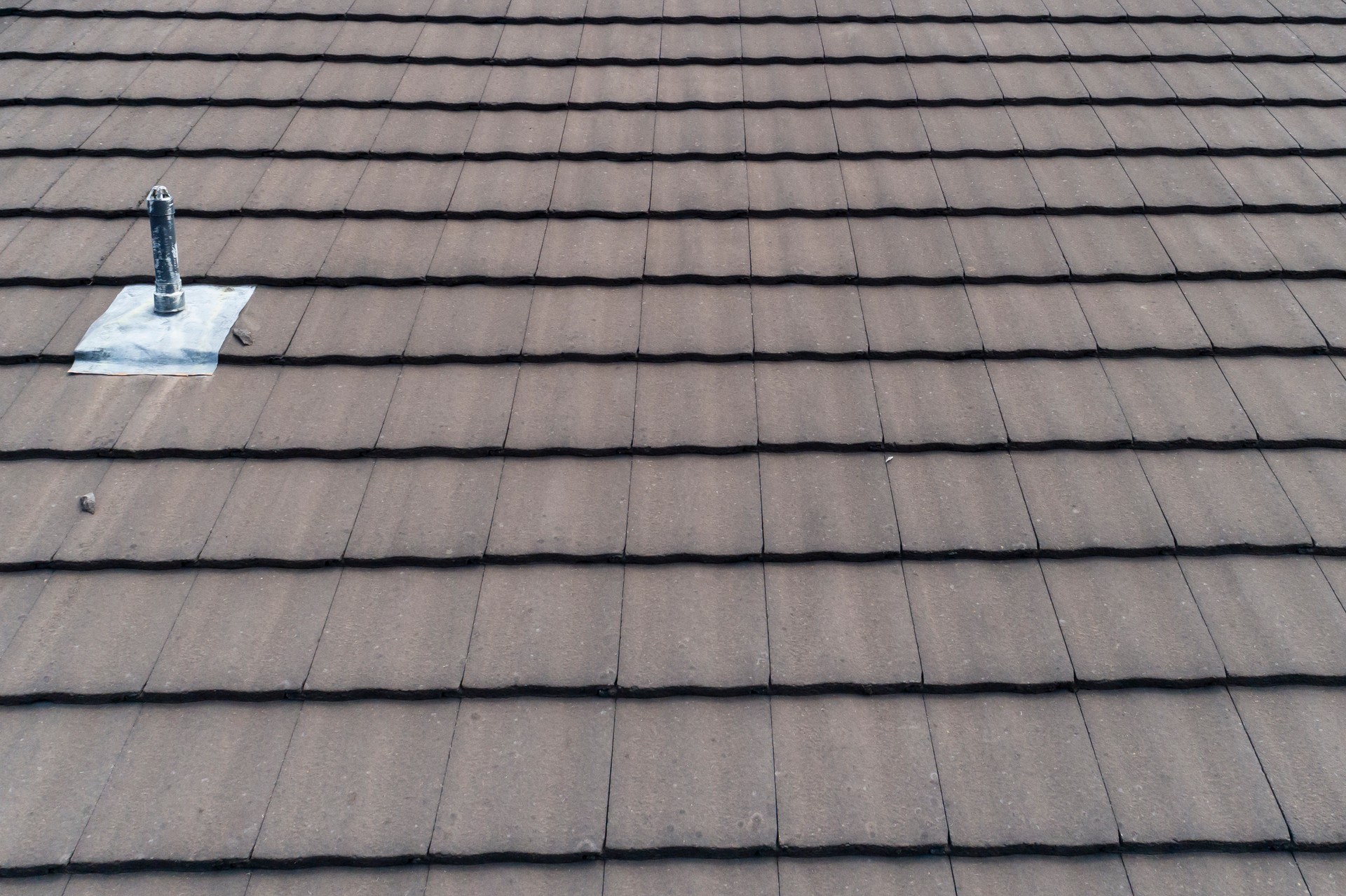 Brown tiles on a residential roof